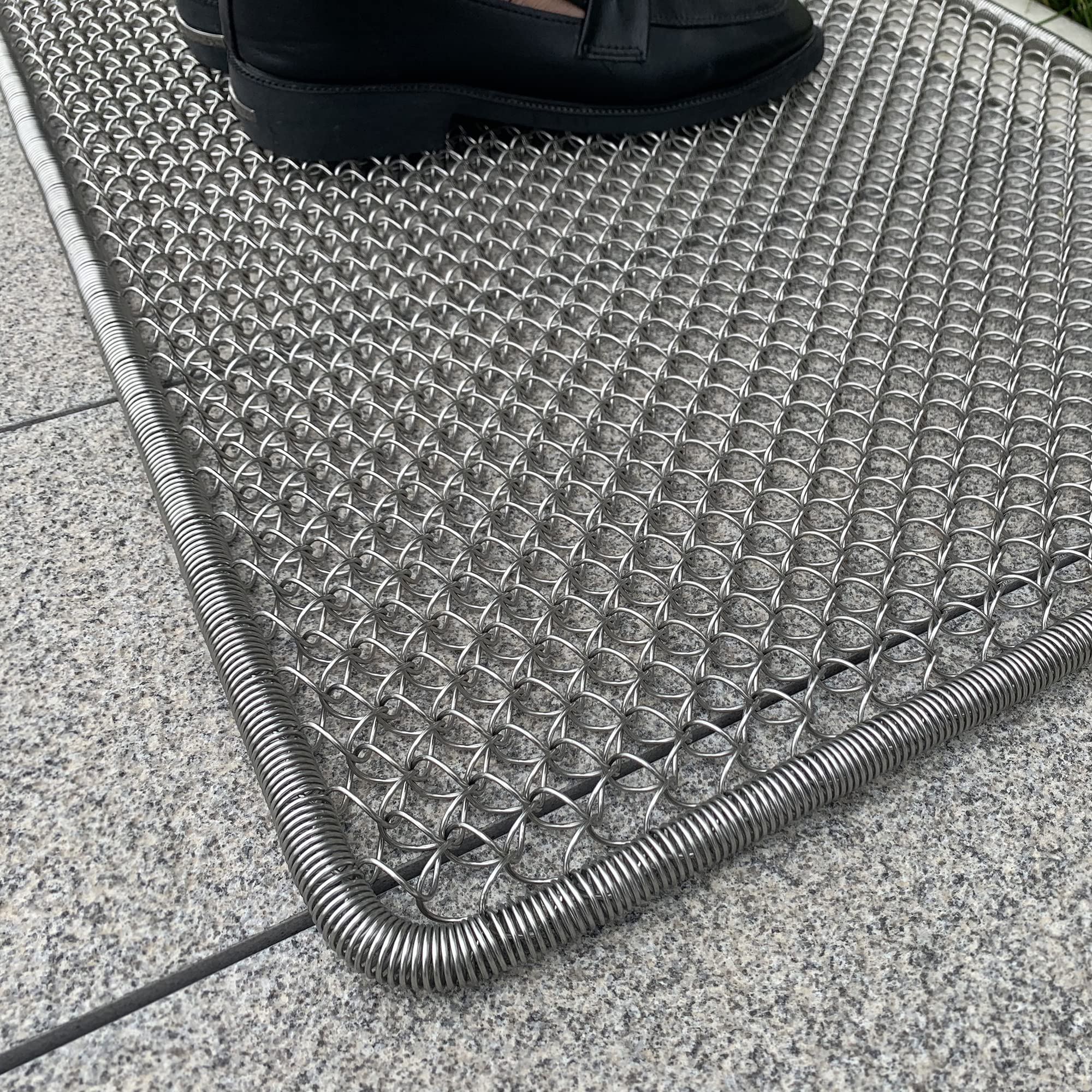 DAOMAER on a front porch scene illustrating durable outdoor protection and clean entry