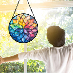 DASTOLL hung in sunlit window creating colored light reflections