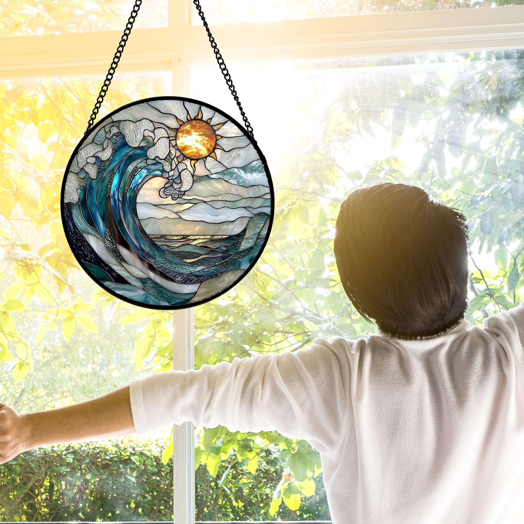 DASTOLL hung in window with sunlight creating colorful display