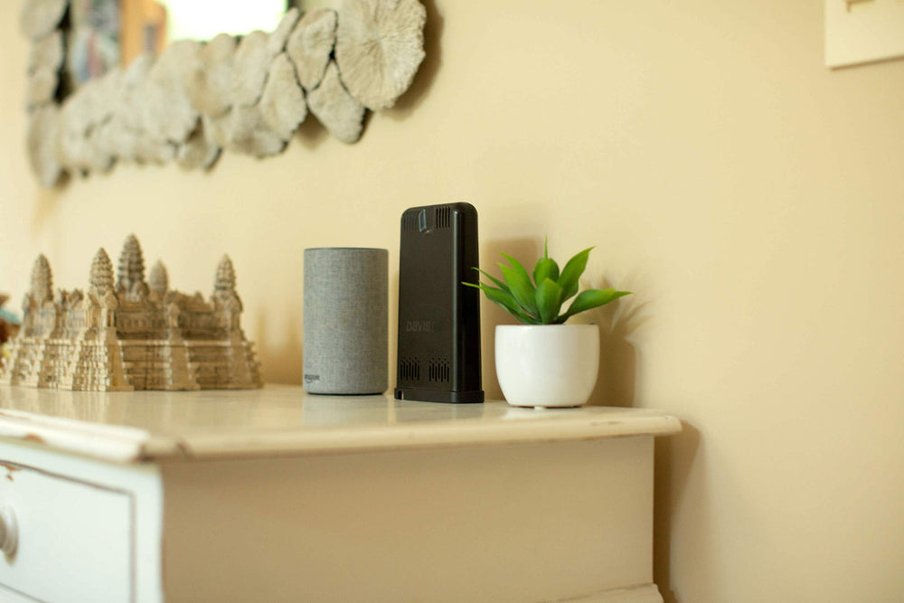 Davis Instruments 6100 next to a smartphone for scale and easy home placement