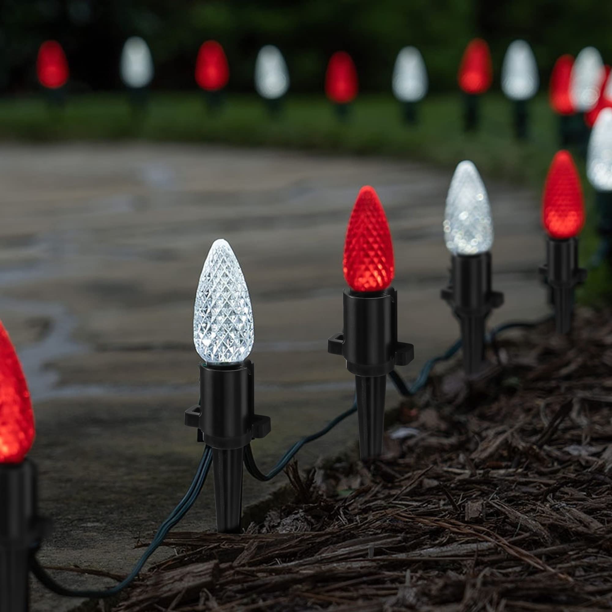 Dazzle Bright pointed tip inserted in soil demonstrating easy ground placement