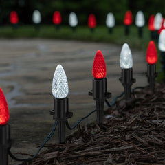 Dazzle Bright pointed tip inserted in soil demonstrating easy ground placement