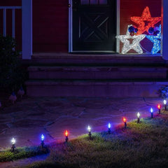 Dazzle Bright stake holding a C9 bulb illustrating secure outdoor illumination