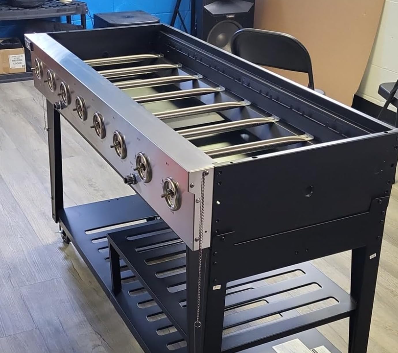 DcYourHome burner installed in grill delivering even heat across grate