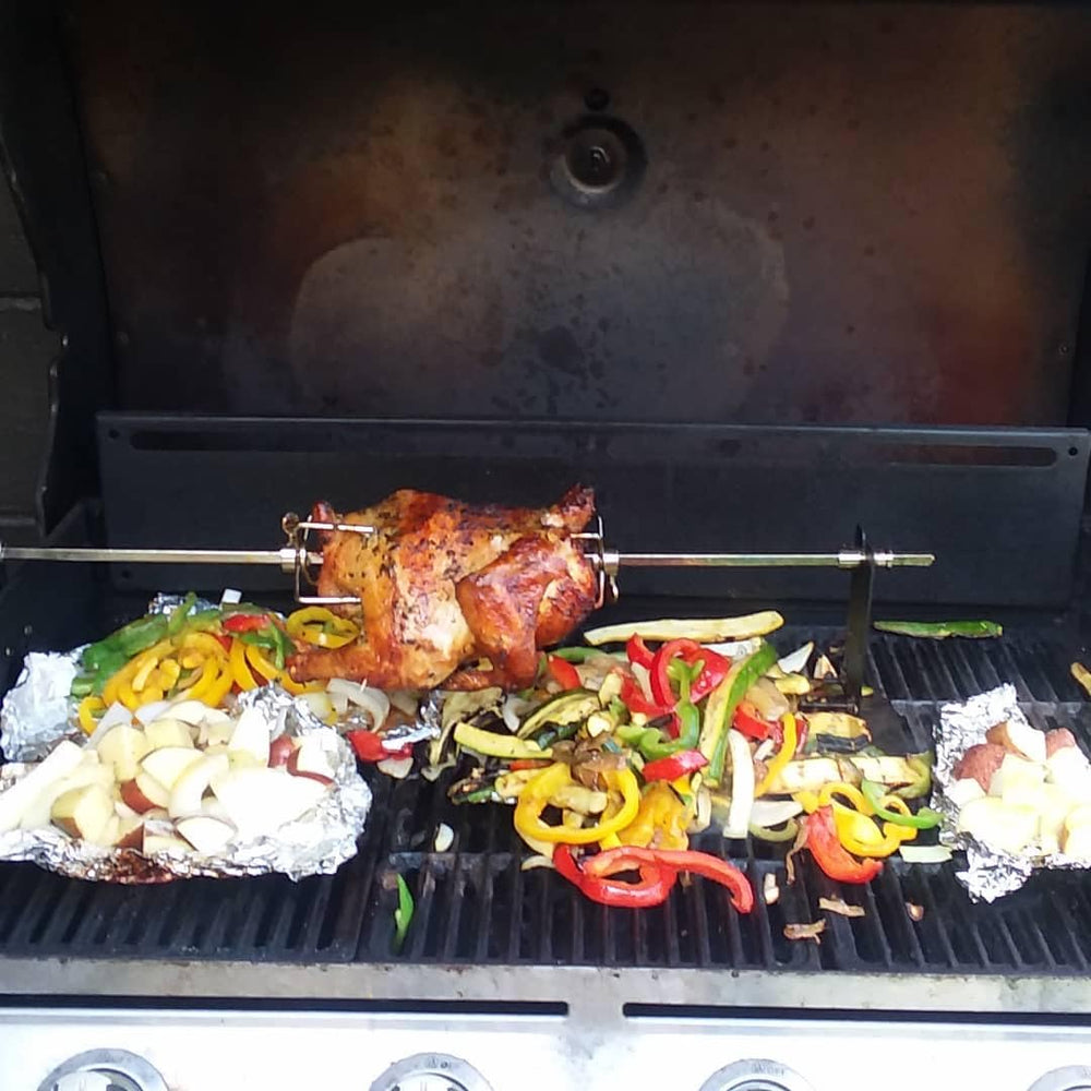 DcYourHome grilled roast on rotisserie in backyard scene suggesting family-style serving