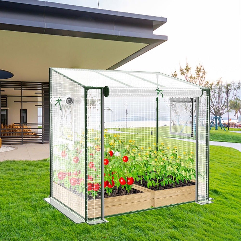 deaunbr greenhouse next to patio chair showing compact size and fit