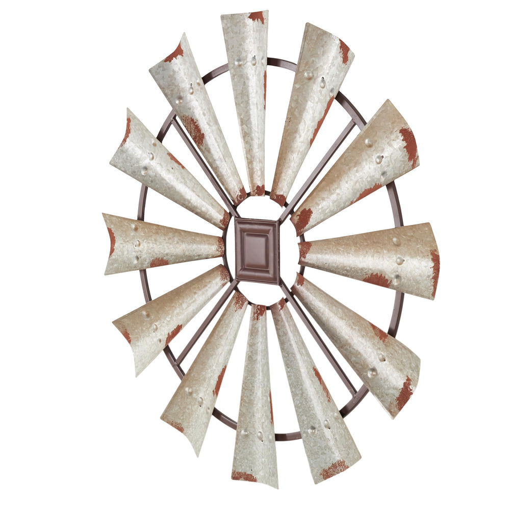 Deco 79 close-up of distressed metal finish highlighting vintage appeal