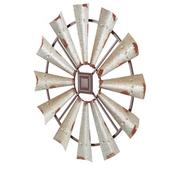 Deco 79 close-up of distressed metal finish highlighting vintage appeal