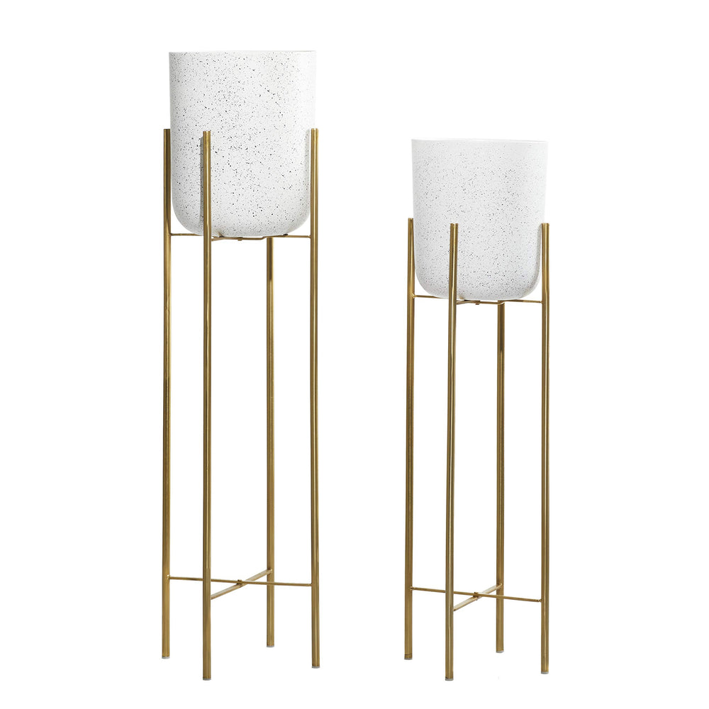 deco 79 planter pair styled in living room adding vertical greenery appeal