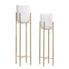 deco 79 planter pair styled in living room adding vertical greenery appeal