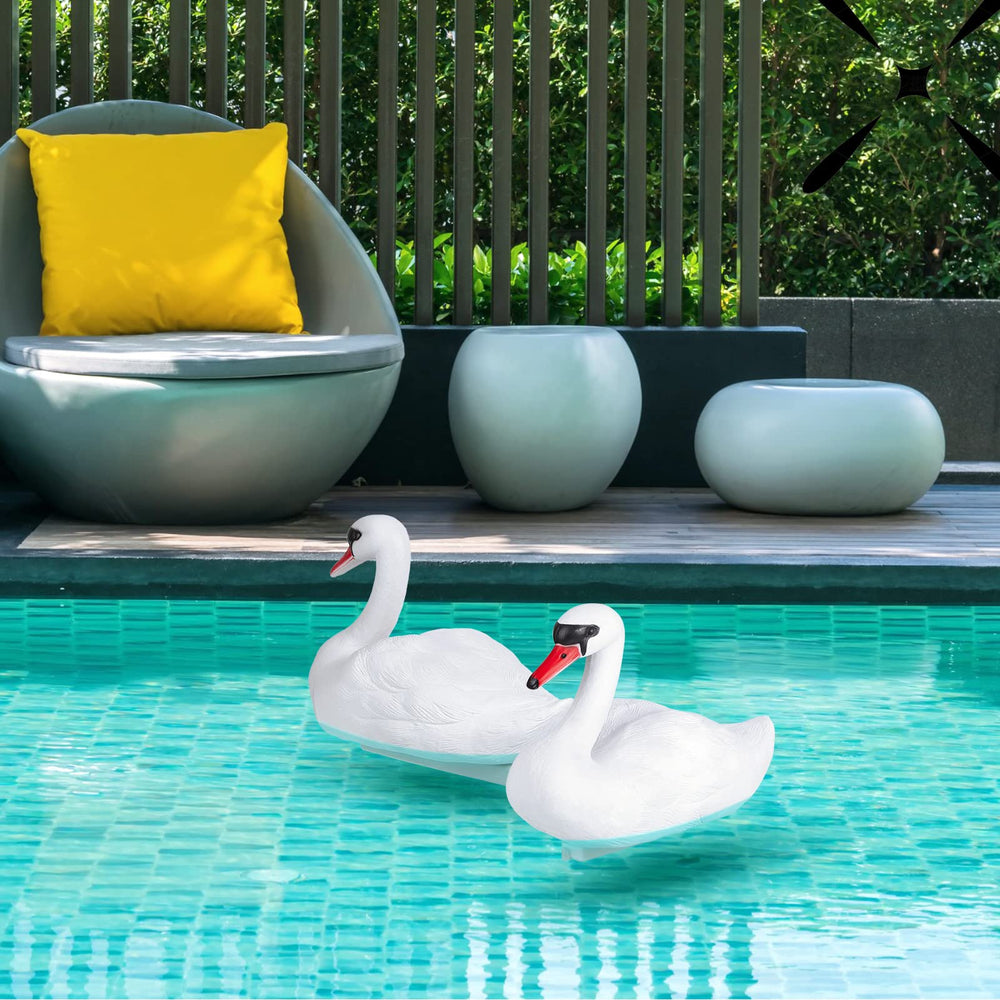 Deekin swan duo in garden setting enhancing landscape aesthetics