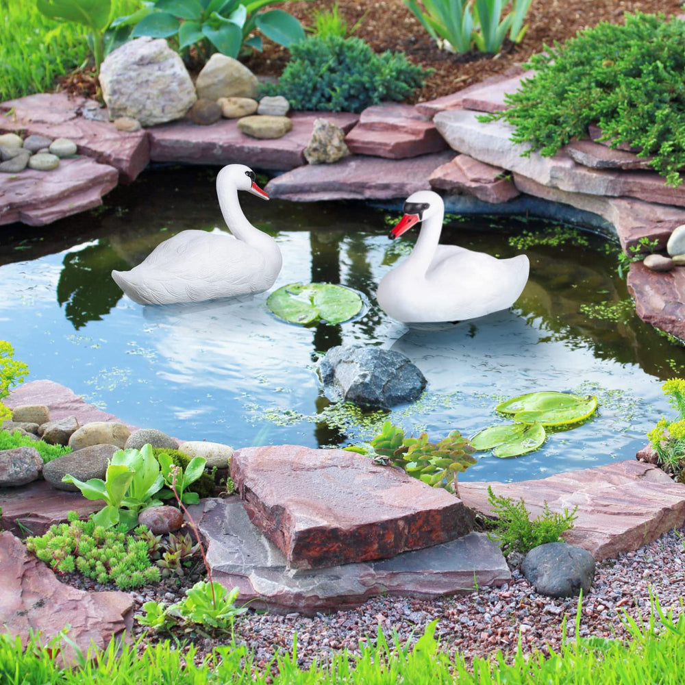 Deekin swan pair in packaging ready to unpack and place in water feature