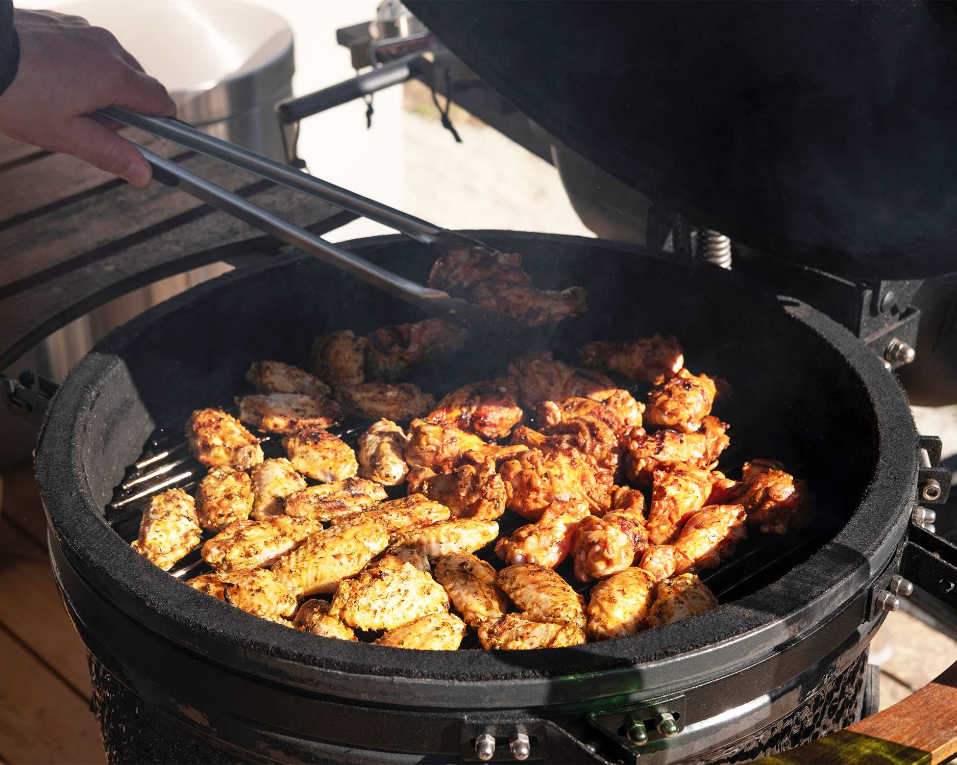 DELSbbq basket in backyard kamado setup speeding heat-up and consistent temps