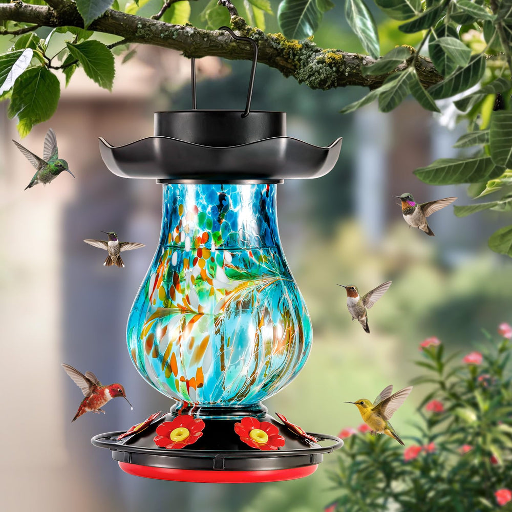 DesGully feeder glowing at dusk with LED colors enhancing evening garden ambience