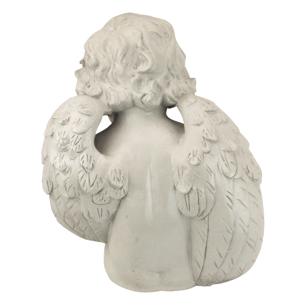 Design Toscano close-up of cherub face showing peaceful expression and detail