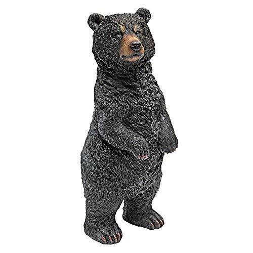 Design Toscano bear statue on porch adding rustic charm and welcoming focal point