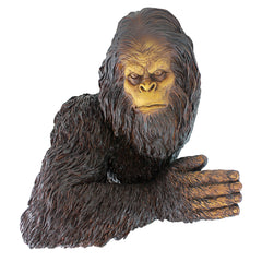 Design Toscano Bigfoot front view showing playful pose and durable finish