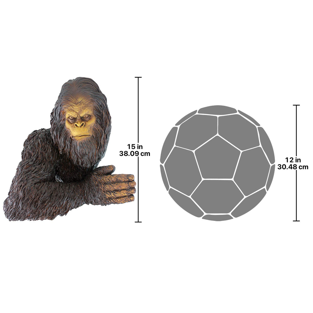 Design Toscano Bigfoot placed indoors by an entry bench adding charm and conversation