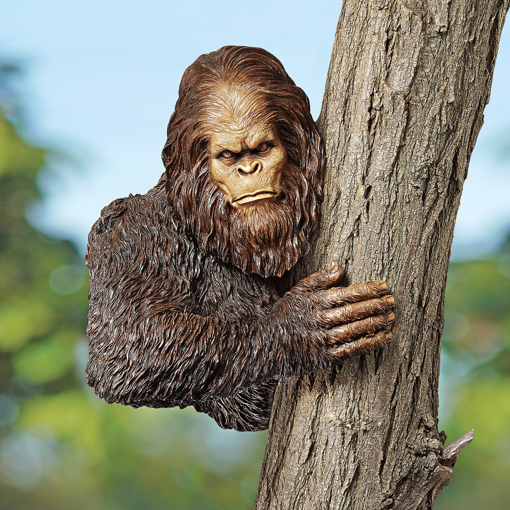 Design Toscano Bigfoot next to potted plant showing scale and easy placement