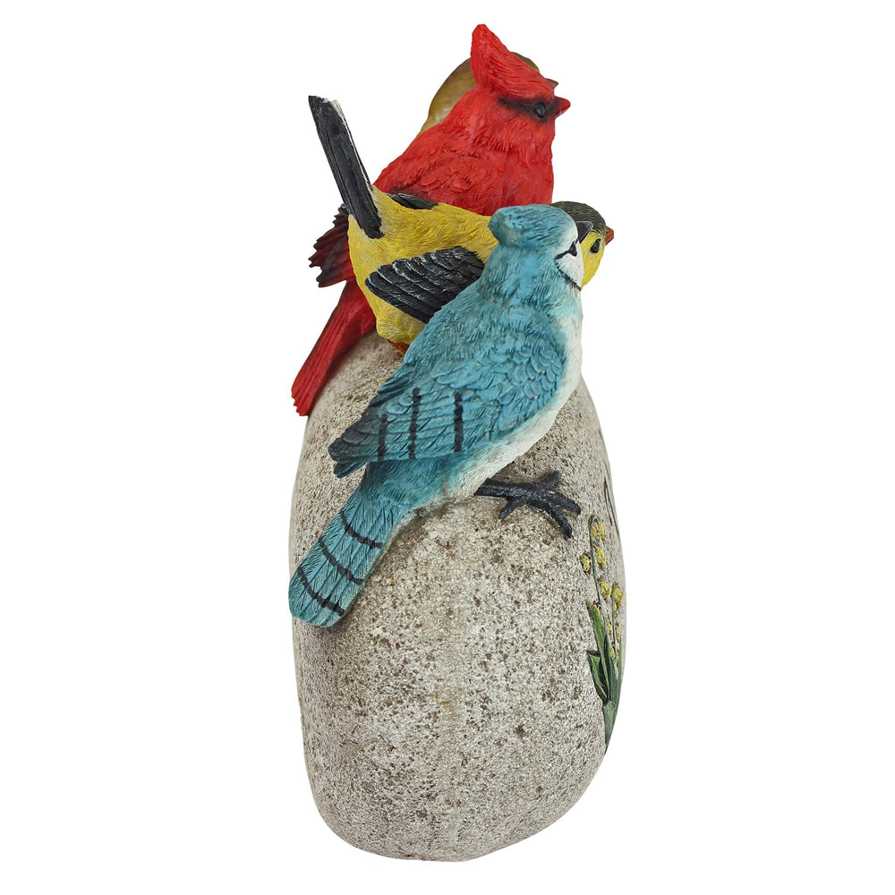 Design Toscano close-up of bird feather texture with detailed paintwork
