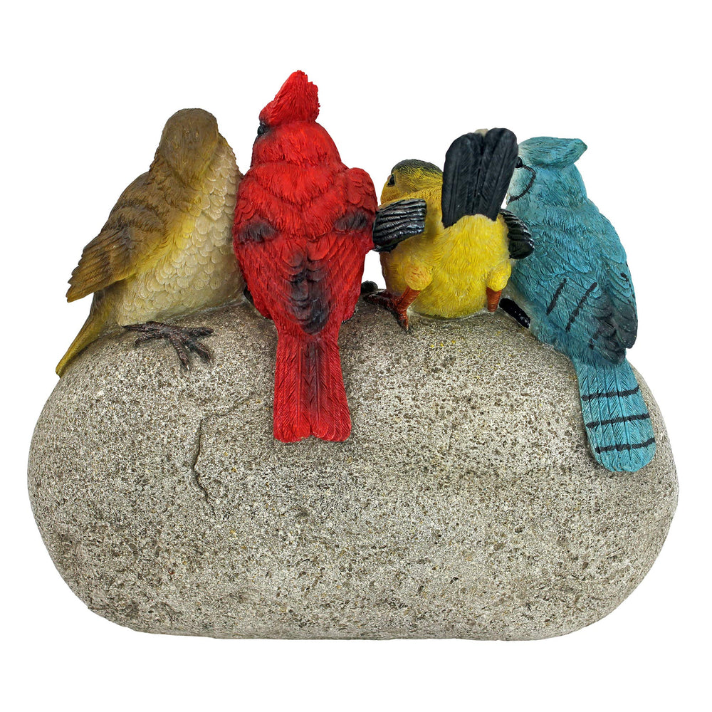 Design Toscano statue held in hand to show compact size and portability