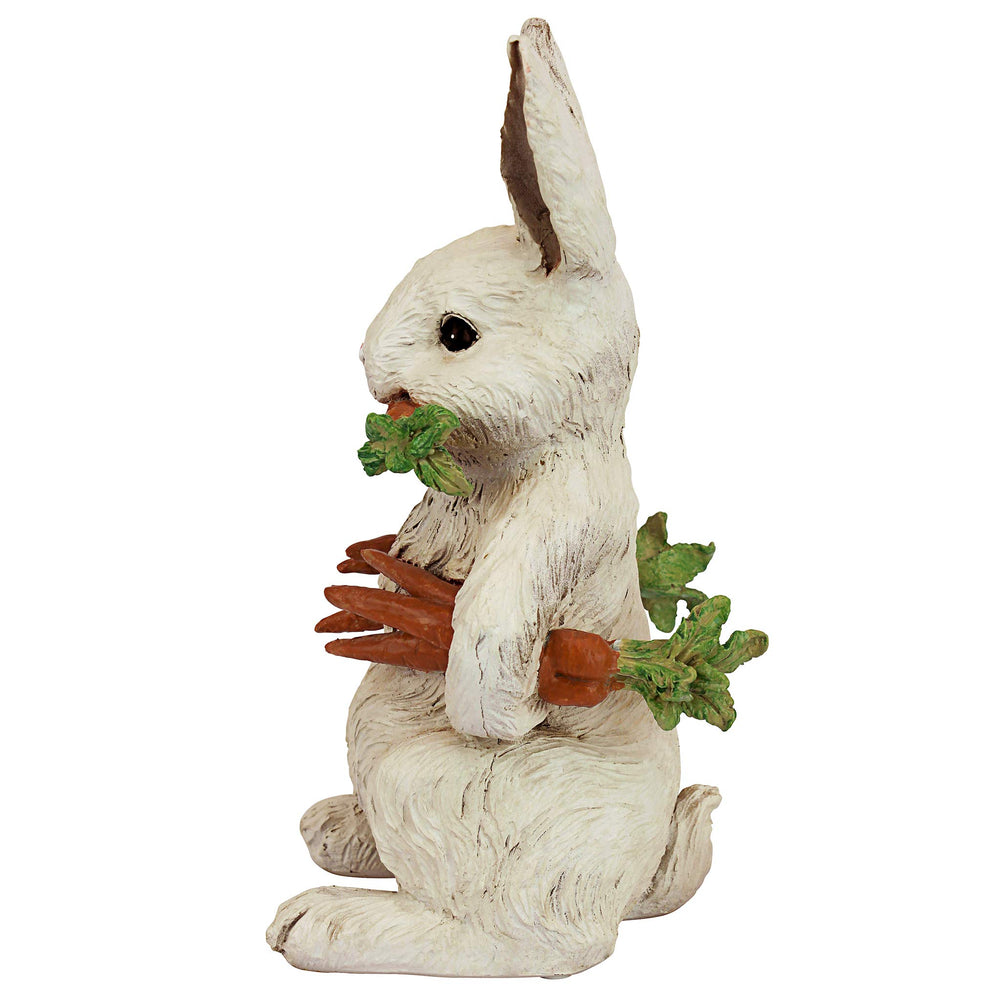 Design Toscano rabbit statue placed in garden offering seasonal charm