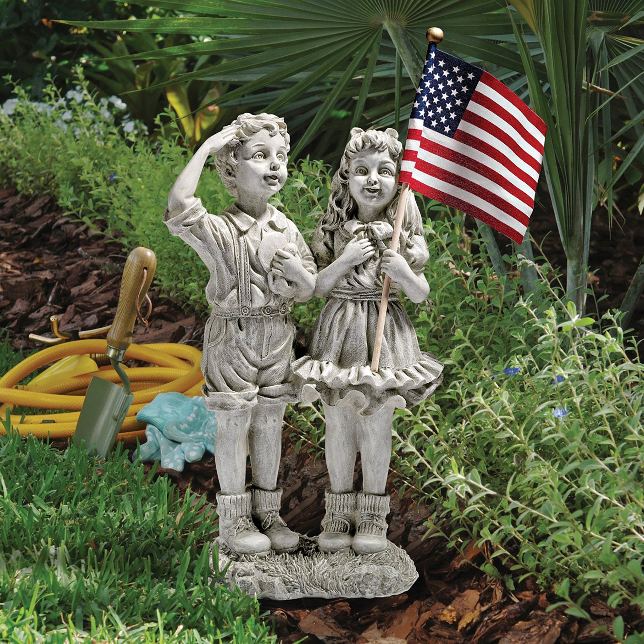 Design Toscano on a mantel demonstrating seasonal display and home decor appeal