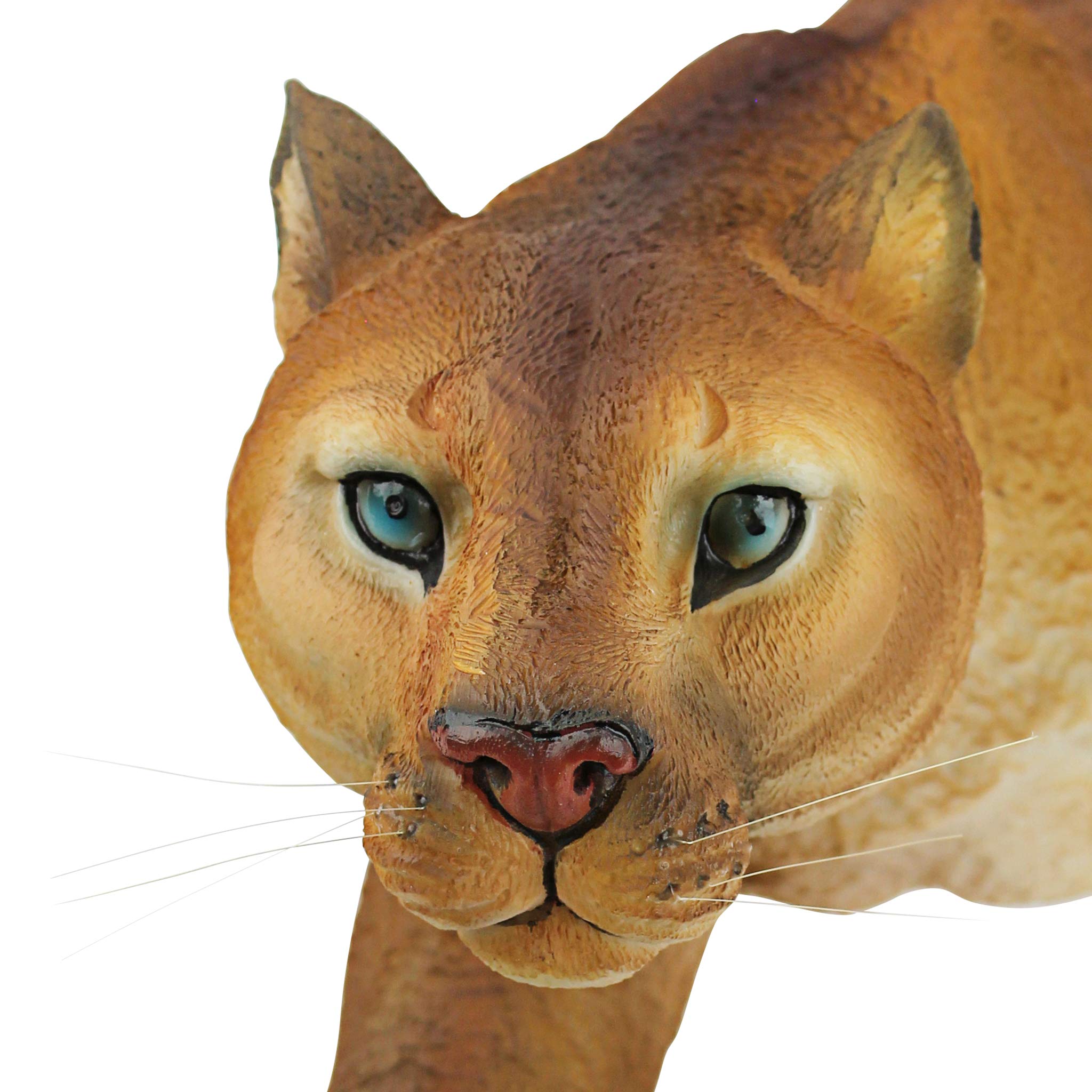 Design Toscano cougar positioned on a stone ledge showing outdoor durability