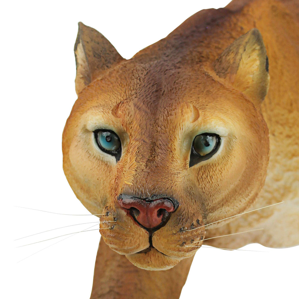 Design Toscano cougar positioned on a stone ledge showing outdoor durability