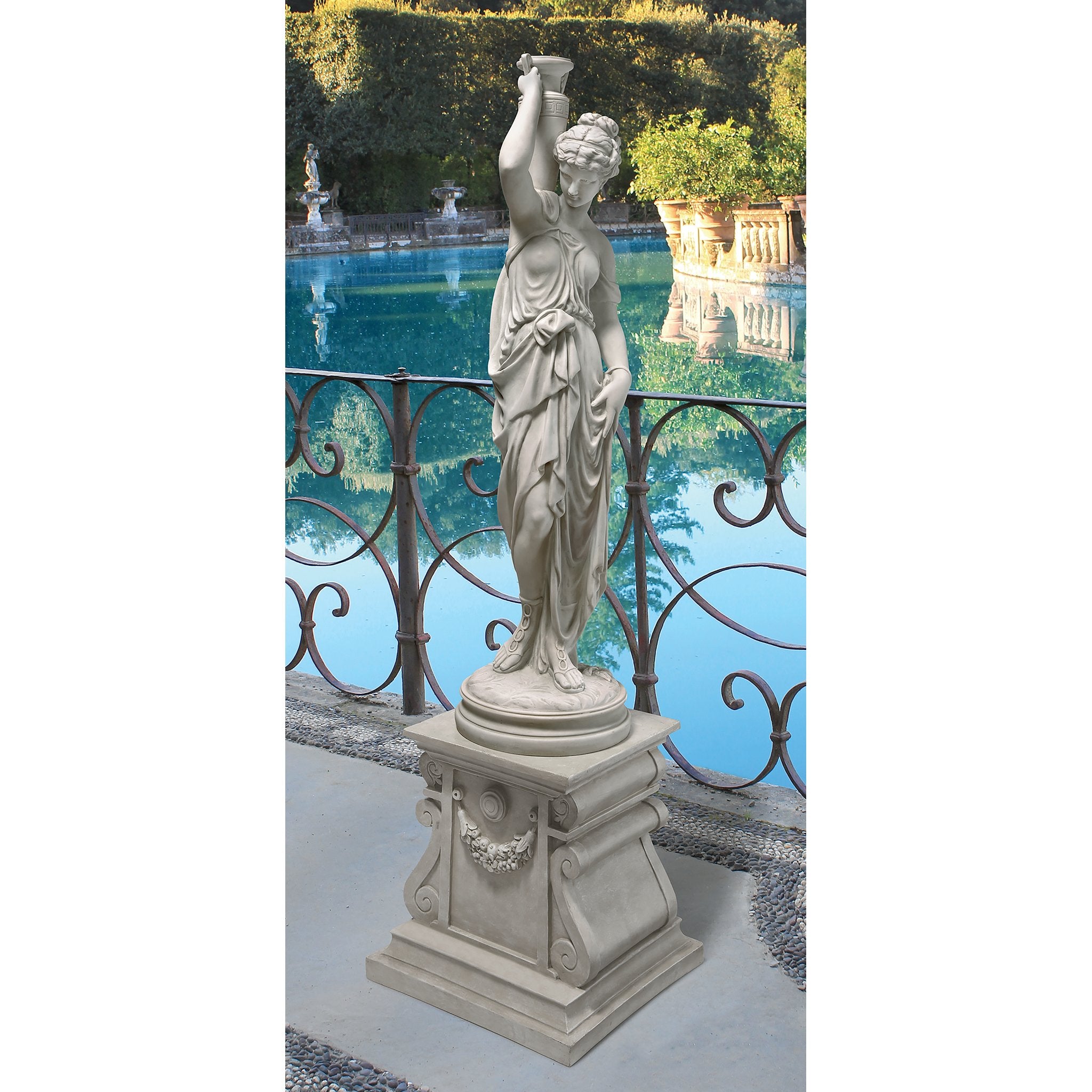 Design Toscano statue next to patio furniture showing scale and placement benefit