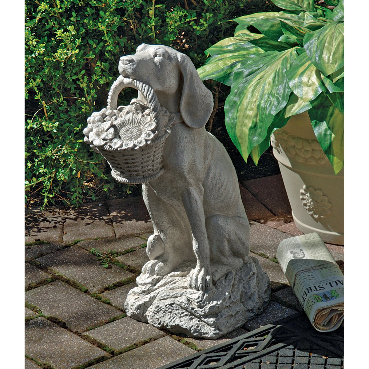 Design Toscano front view of dog statue showing welcoming pose and antique stone finish for curb appeal