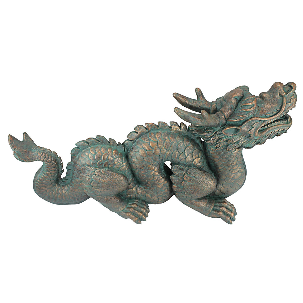 Design Toscano dragon in garden setting illustrating scale and decorative enhancement