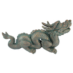 Design Toscano dragon in garden setting illustrating scale and decorative enhancement