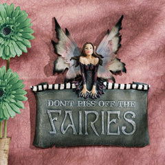 Design Toscano close-up of hand-painted fairy details highlighting textured finish