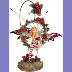Design Toscano fairy in shelf lifestyle demonstrates scale and whimsical decor appeal