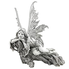 Design Toscano side profile of pixie statue highlighting contemplative expression