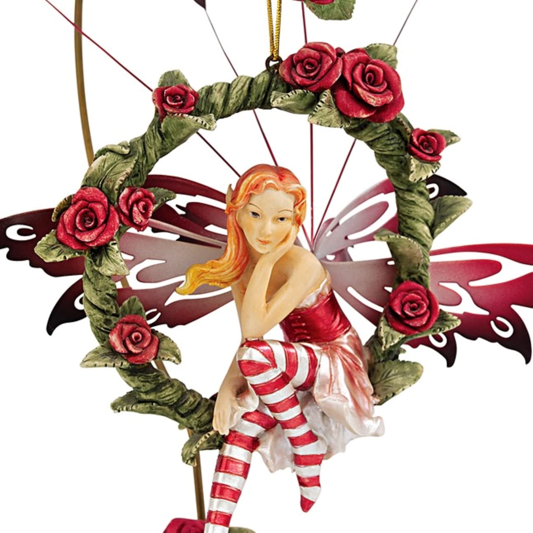 Design Toscano fairy wing closeup metal finish shows hand-painted detail and durable shine