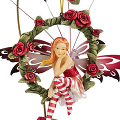 Design Toscano fairy wing closeup metal finish shows hand-painted detail and durable shine