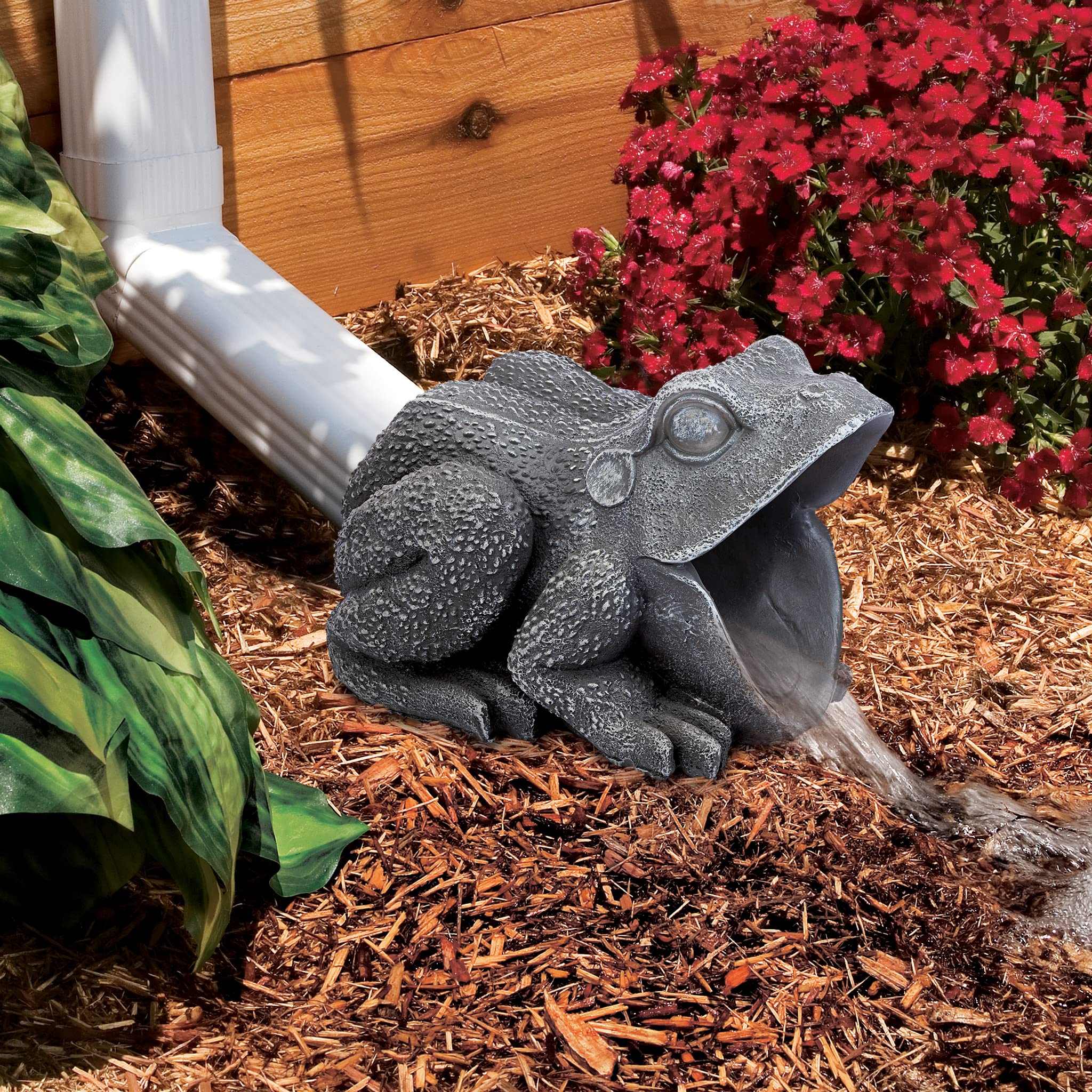 Design Toscano frog installed in garden adds whimsical charm