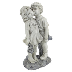 Design Toscano front view of kissing children statue showing welcoming porch charm