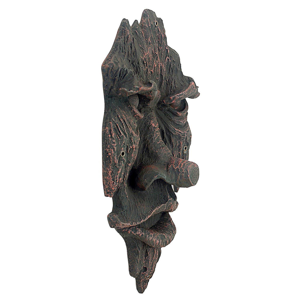 Design Toscano mounted on tree trunk demonstrating conforming fit and natural look