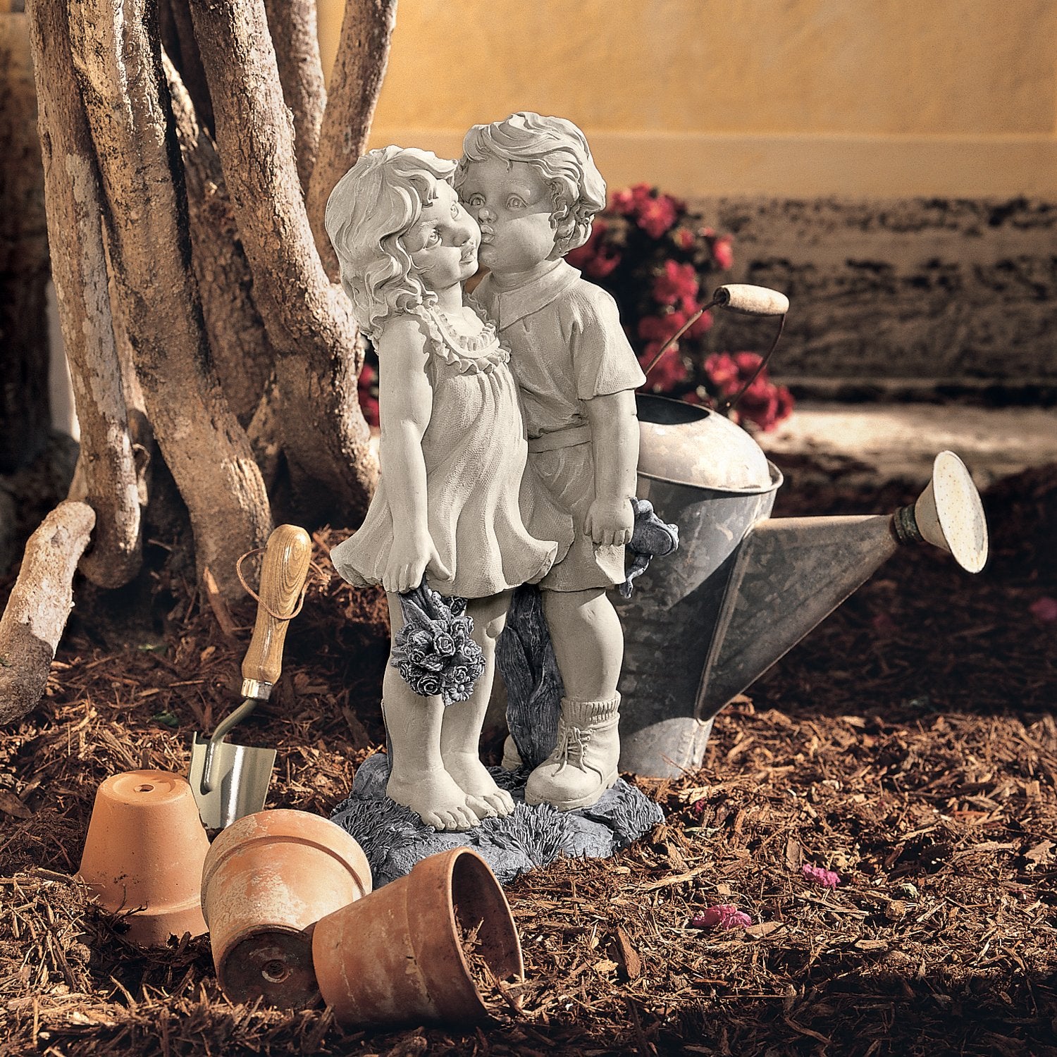 Design Toscano hidden frog behind statue adding whimsical surprise