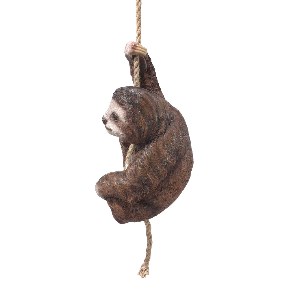 Design Toscano Horatio hanging in tree with rope, creates whimsical garden accent