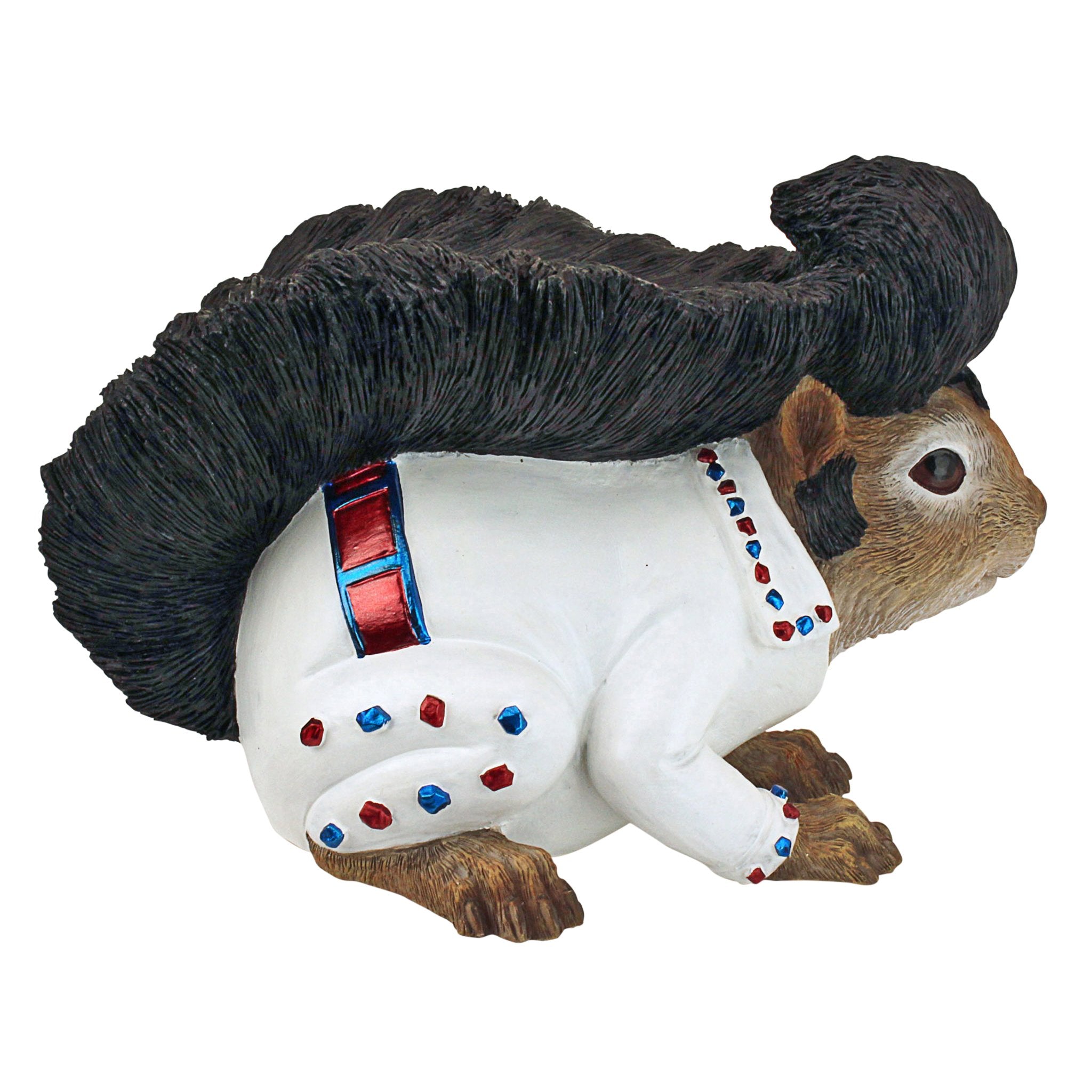 Design Toscano statue placed in a garden adding whimsical focal interest