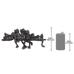 Design Toscano frogs on a windowsill adding playful decor to indoor space