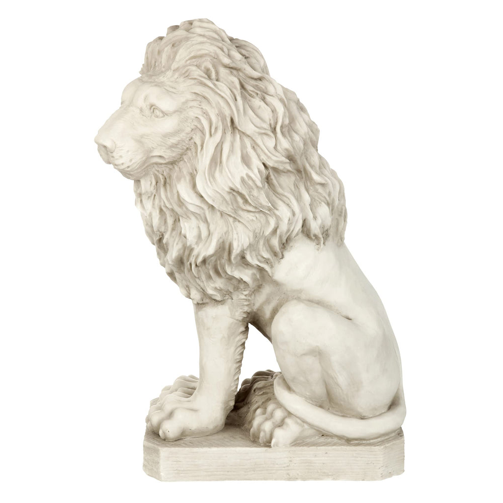 Design Toscano lion on fireplace hearth adding formal indoor focal point