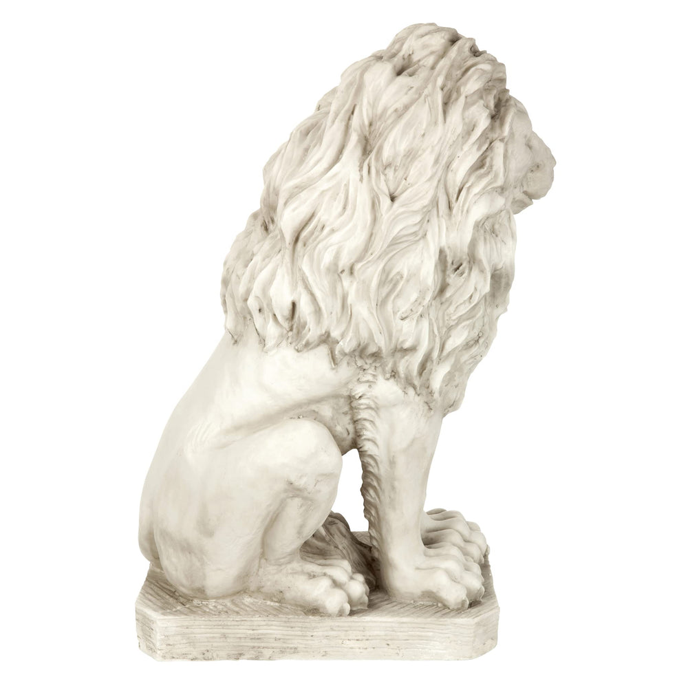 Design Toscano lion beside plinth showing scale and easy placement benefit