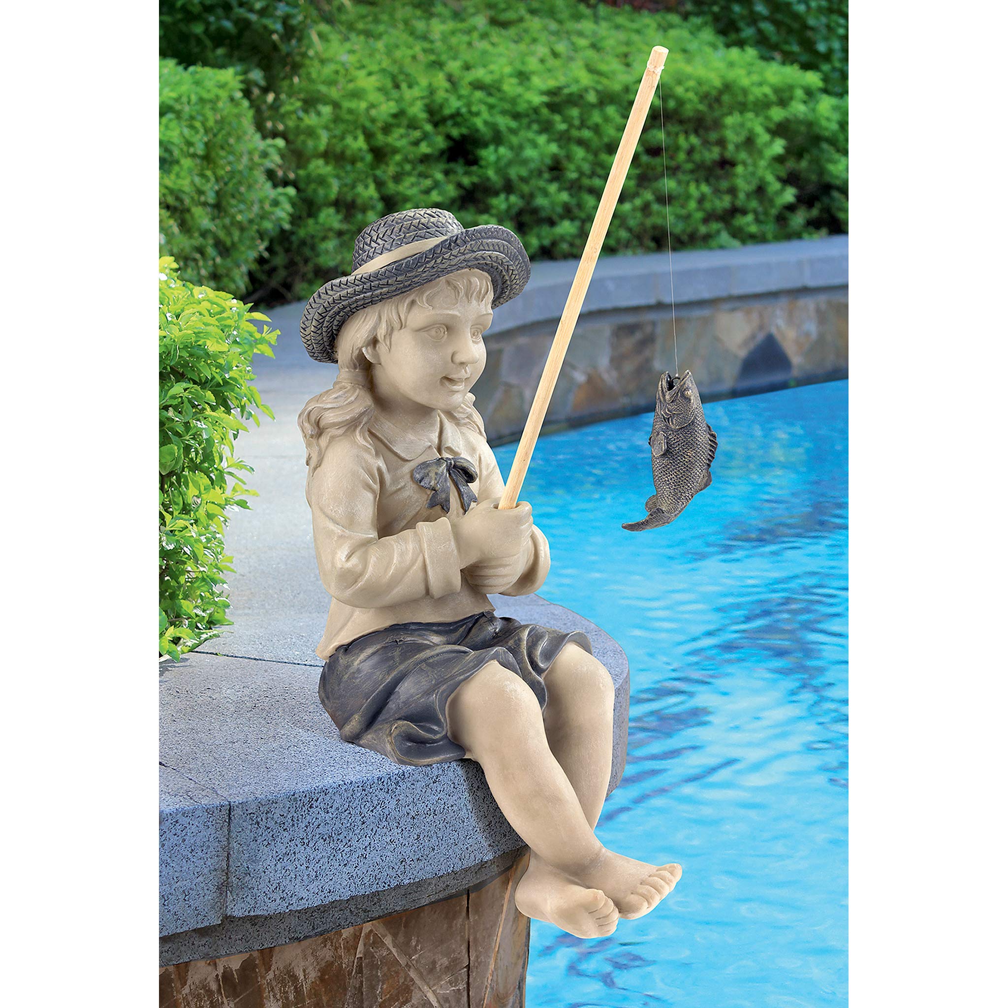 Design Toscano Nellie placed in garden demonstrating charm and outdoor focal use