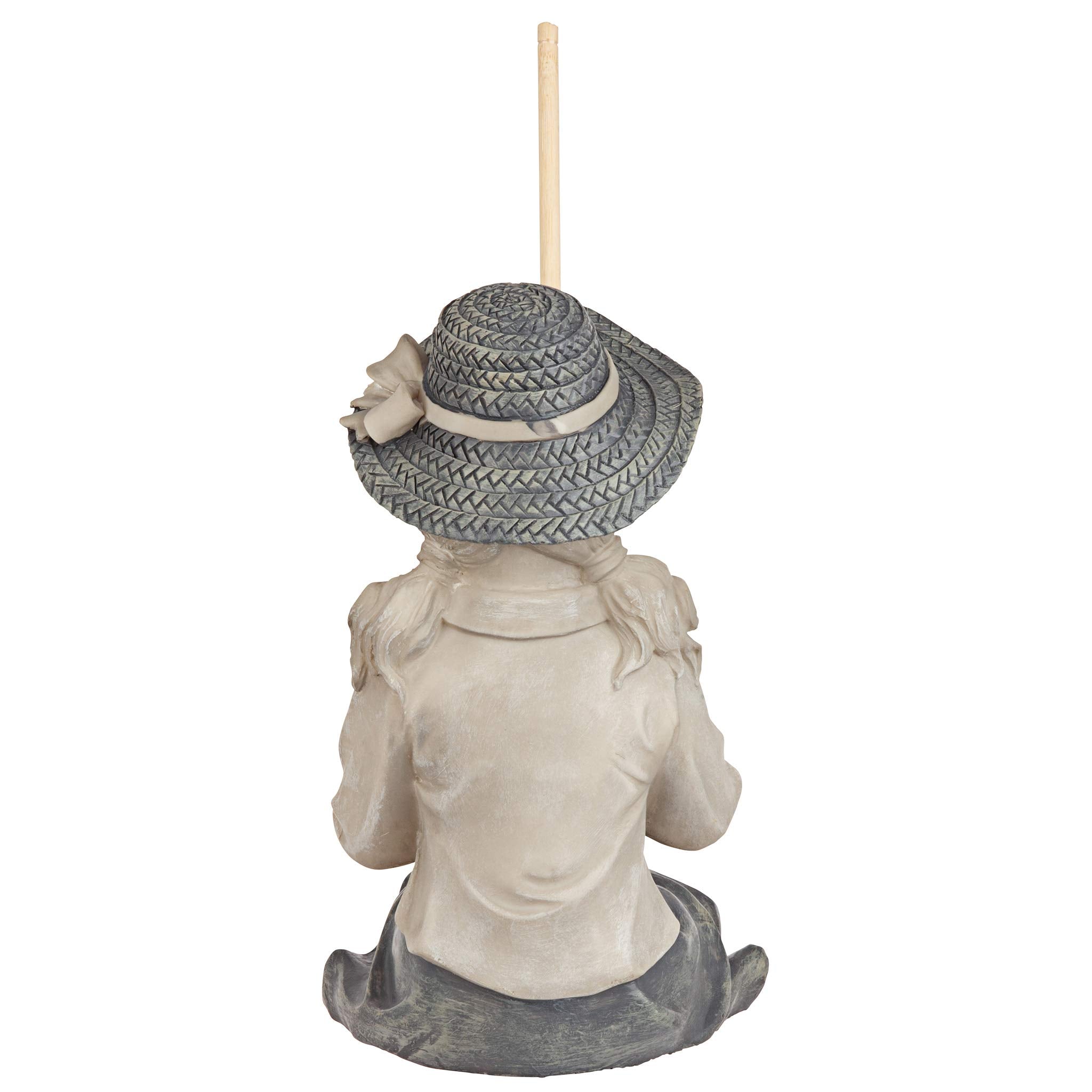 Design Toscano statue next to potted plant showing scale and placement option