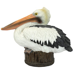 Design Toscano front view of pelican statue showing realistic pose and coastal charm